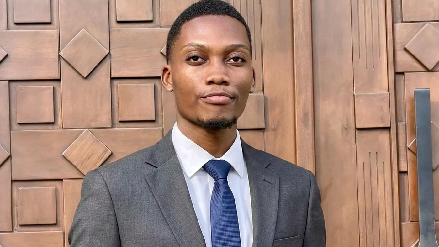 Portrait of Eugene Awagah in a suit
